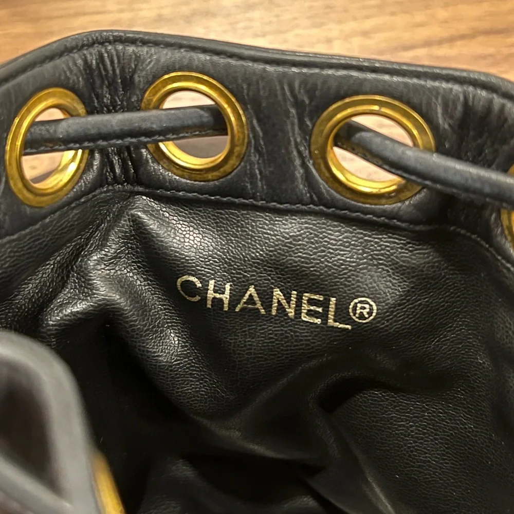 CHANEL Black Quilted Leather Drawstring Bucket Bag with Gold Hardware